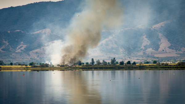 When they burn off the cane stubble, the valley fills with smoke