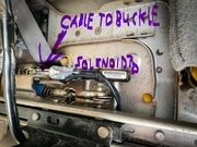 seatbelt under seat pieces  cable on left, solenoid on right